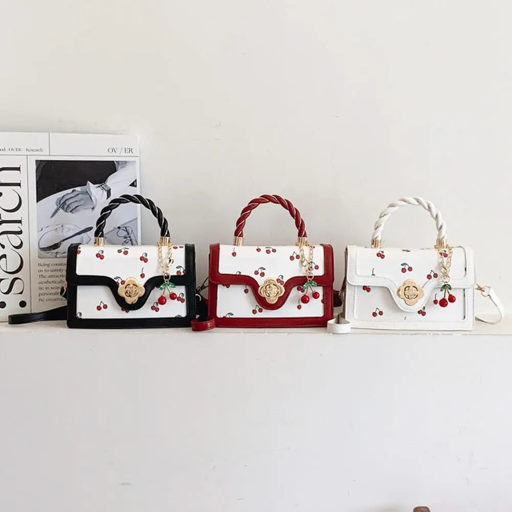 Women Mini Cherry Print Handbag Cute Twist Handle Crossbody Purse Flower Turn‑lock PU Leather Small Shoulder Bag With Cherry Pendant Removable Strap Fashion Daily Satchel Bag